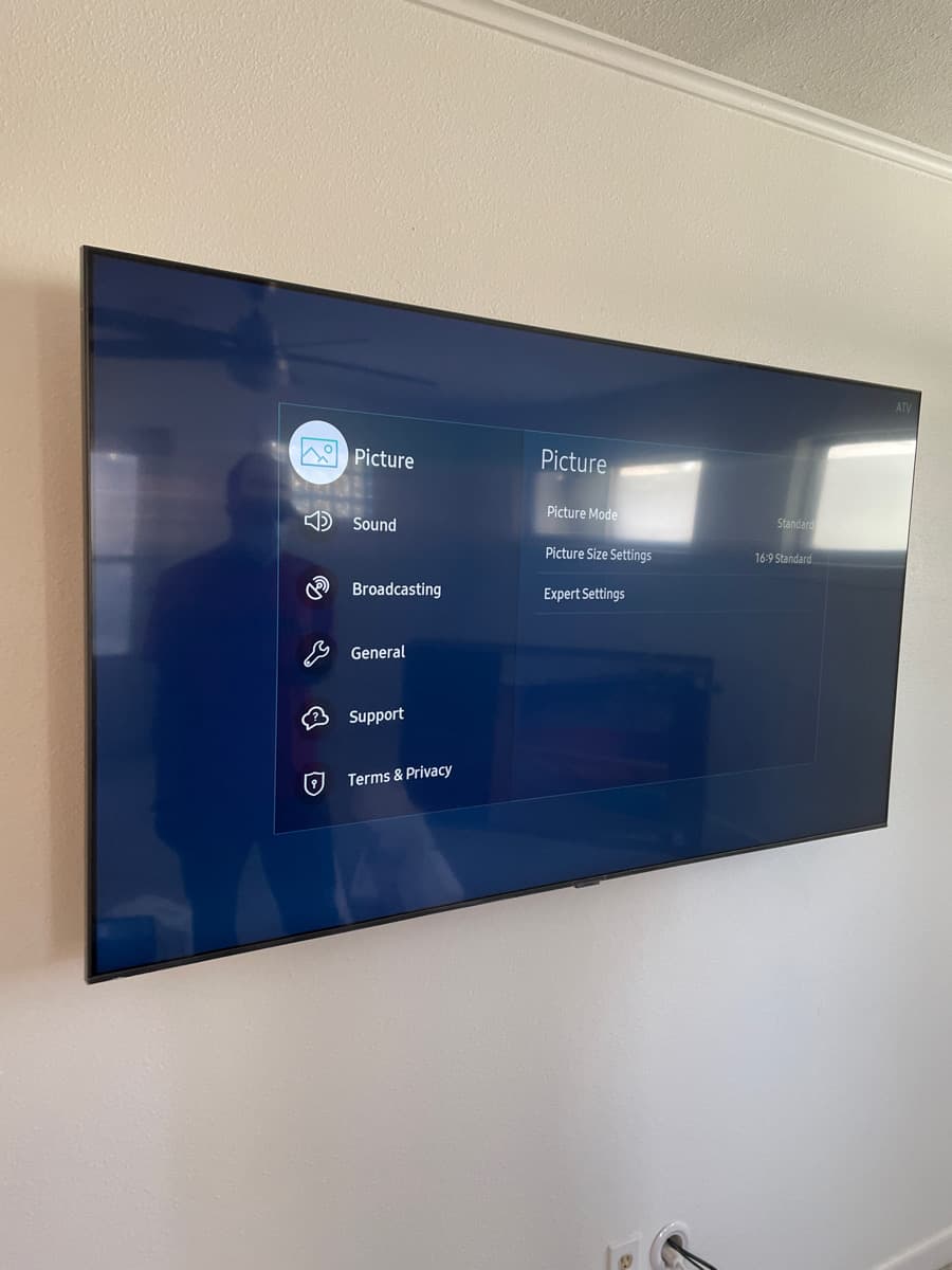Samsung Frame TV mounted flush with Sonos audio integrated