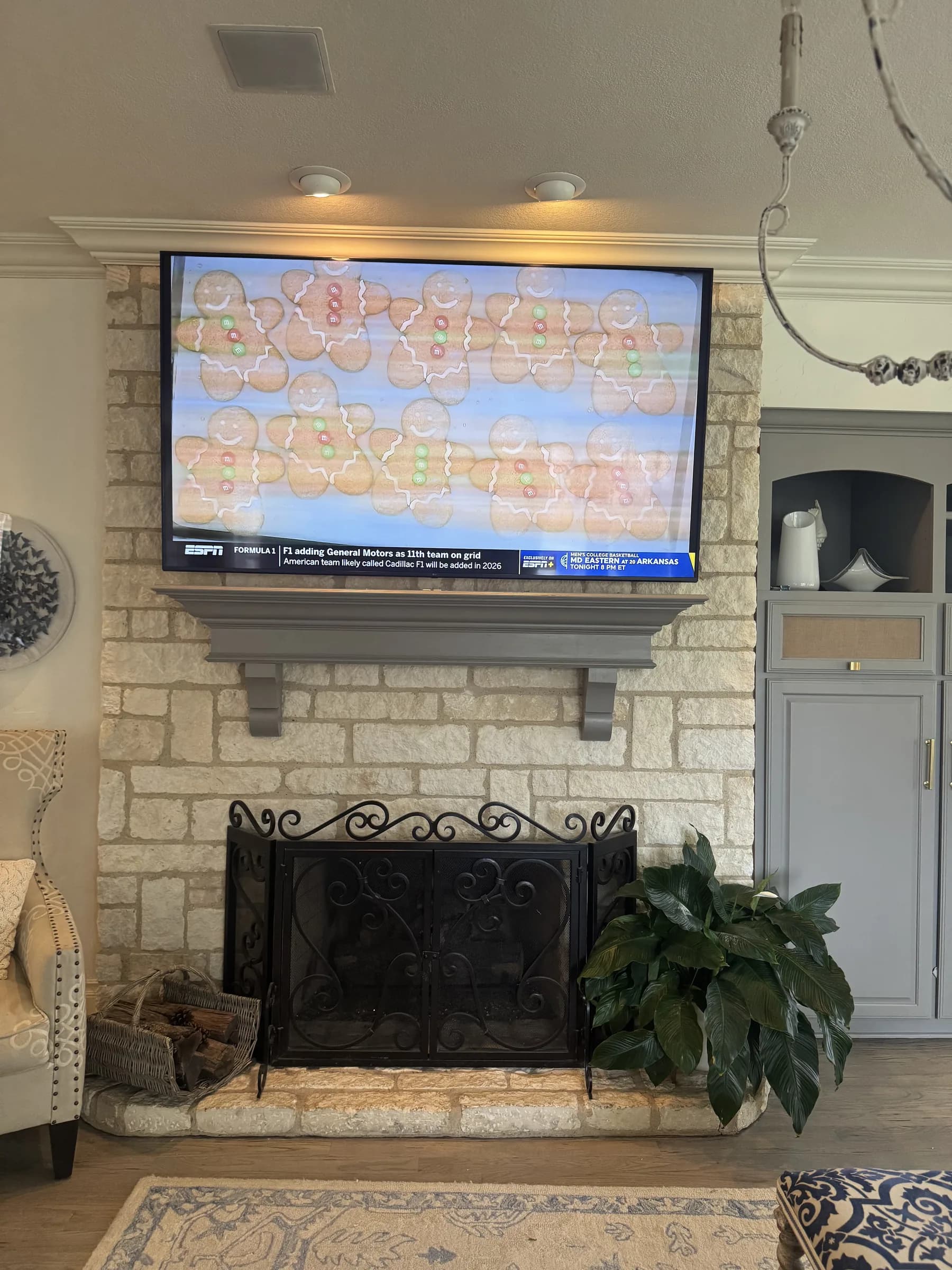 On-site Cognito technician mounting a television in a DFW home