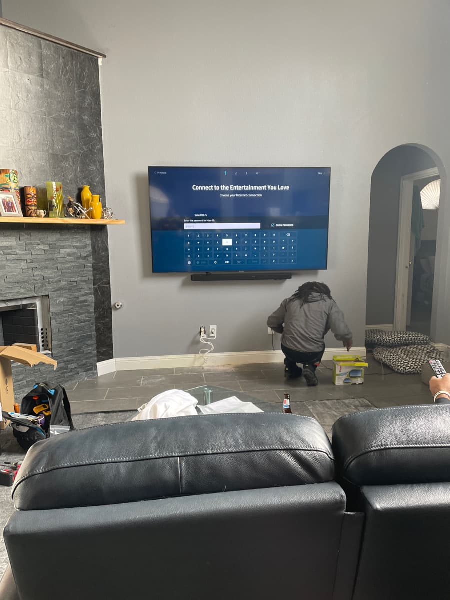 Cognito Media Services technician commissioning a smart home install