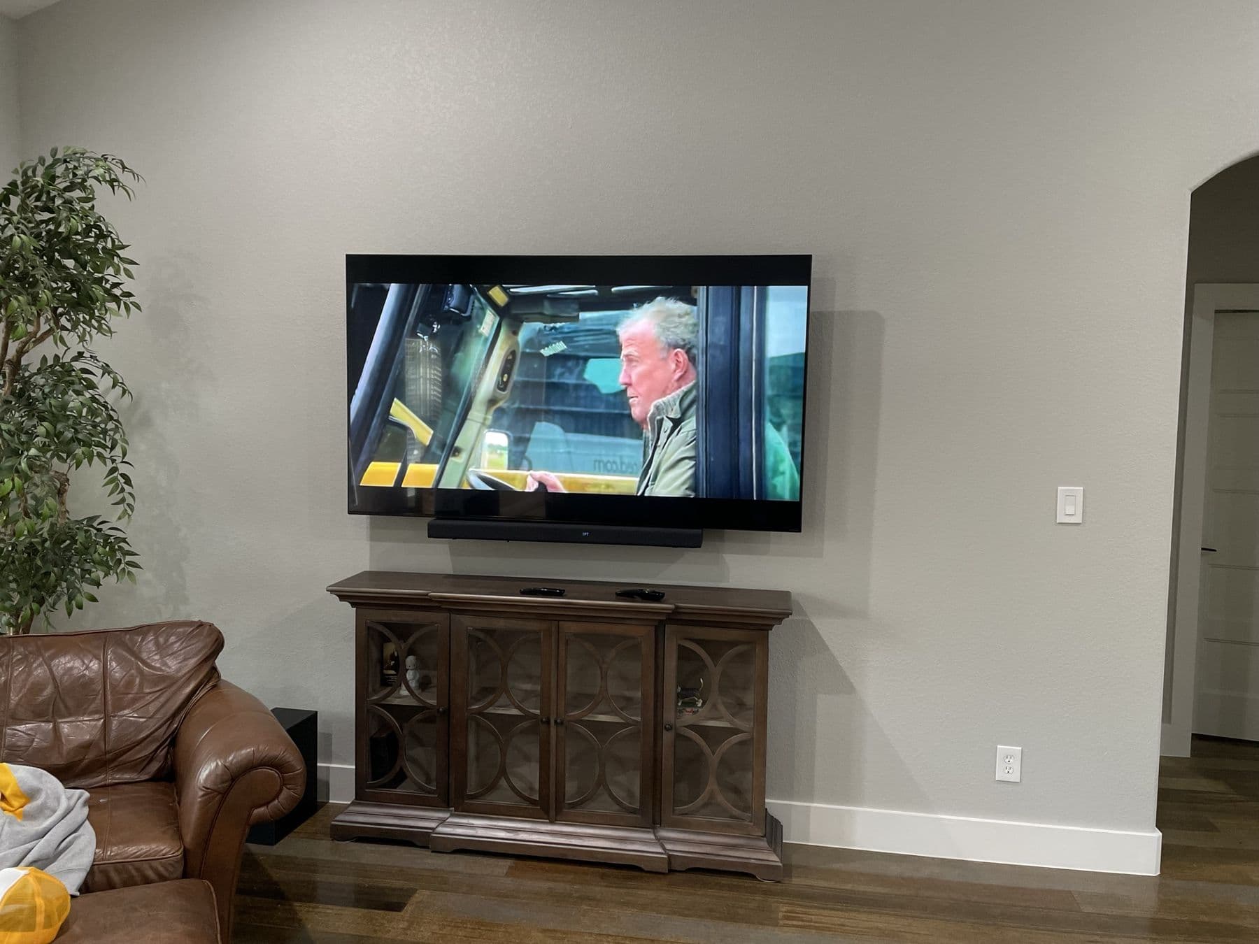 Wall-mounted TV in a Dallas living room