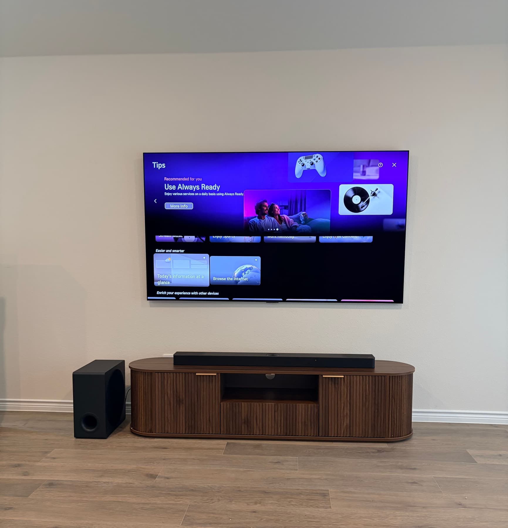 LG TV Over a Walnut Media Console
