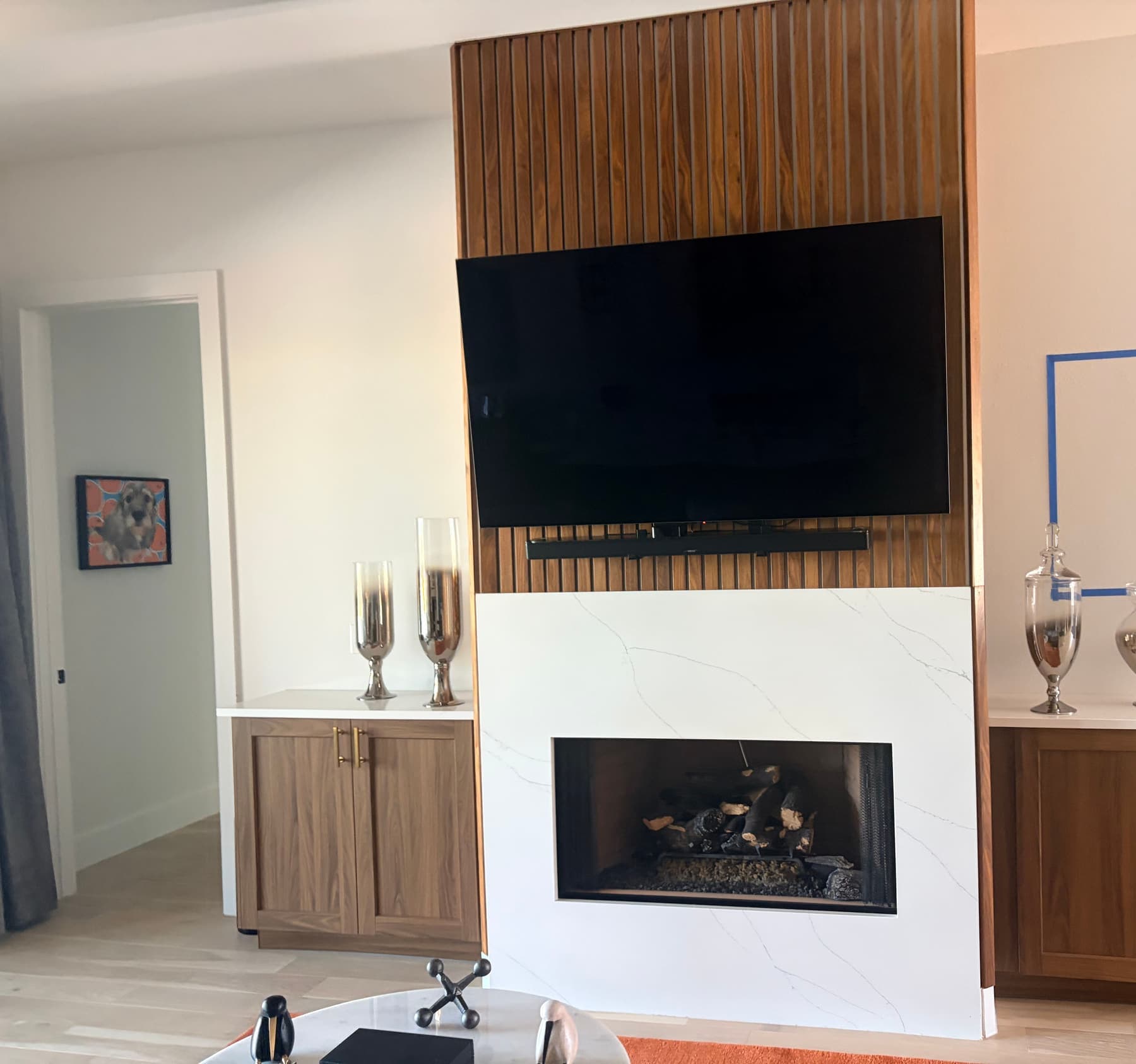Walnut Slat Wall, Marble Fireplace