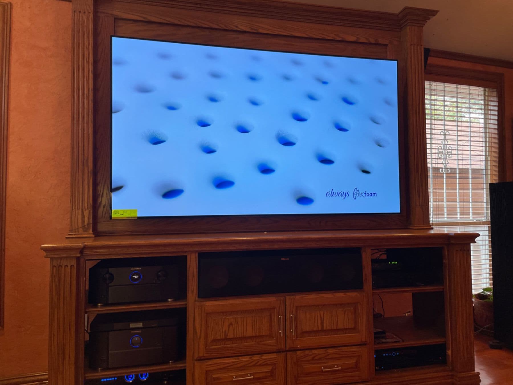 Finished entertainment center and theater install in a DFW home