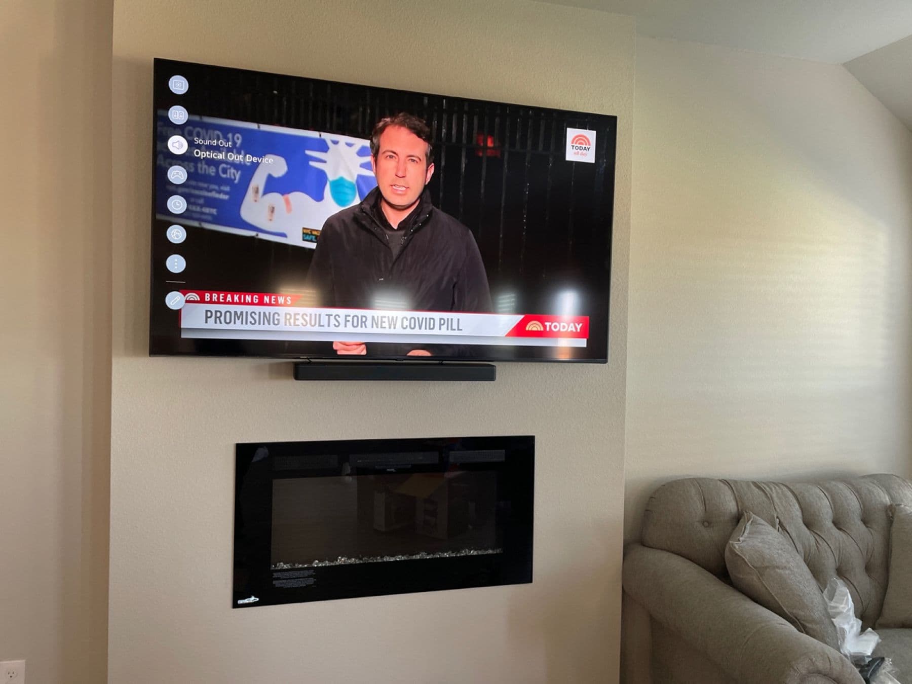 Cognito stone fireplace TV mounting with Sonos soundbar in Frisco home